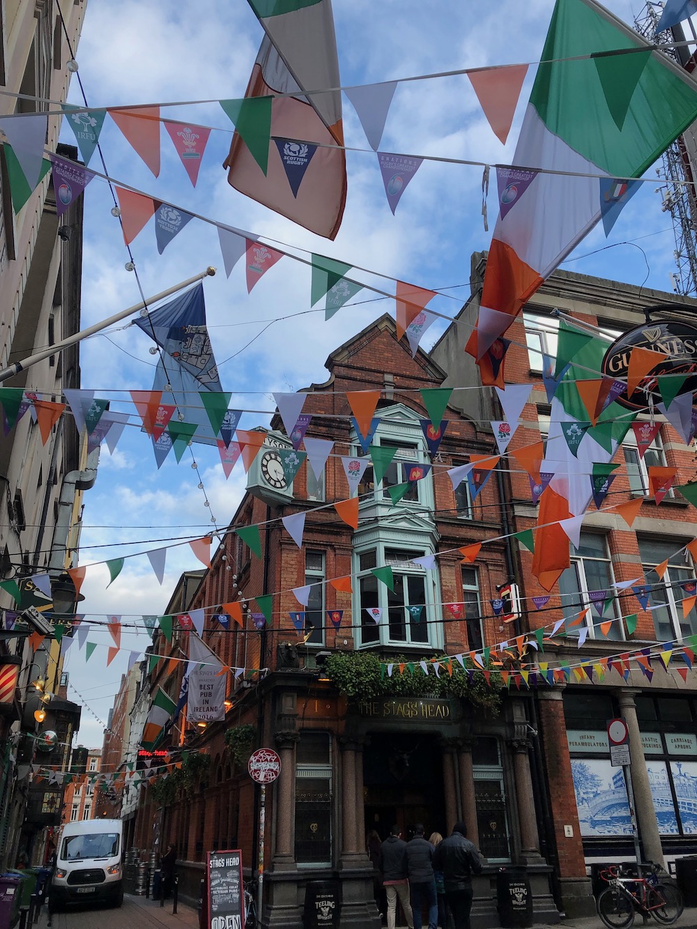 Photo of Irish flags in front of a pub in Dublin